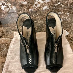 Jimmy Choo Mayva slingback peep toe Sz 7.5
(Fit sz 7 foot)